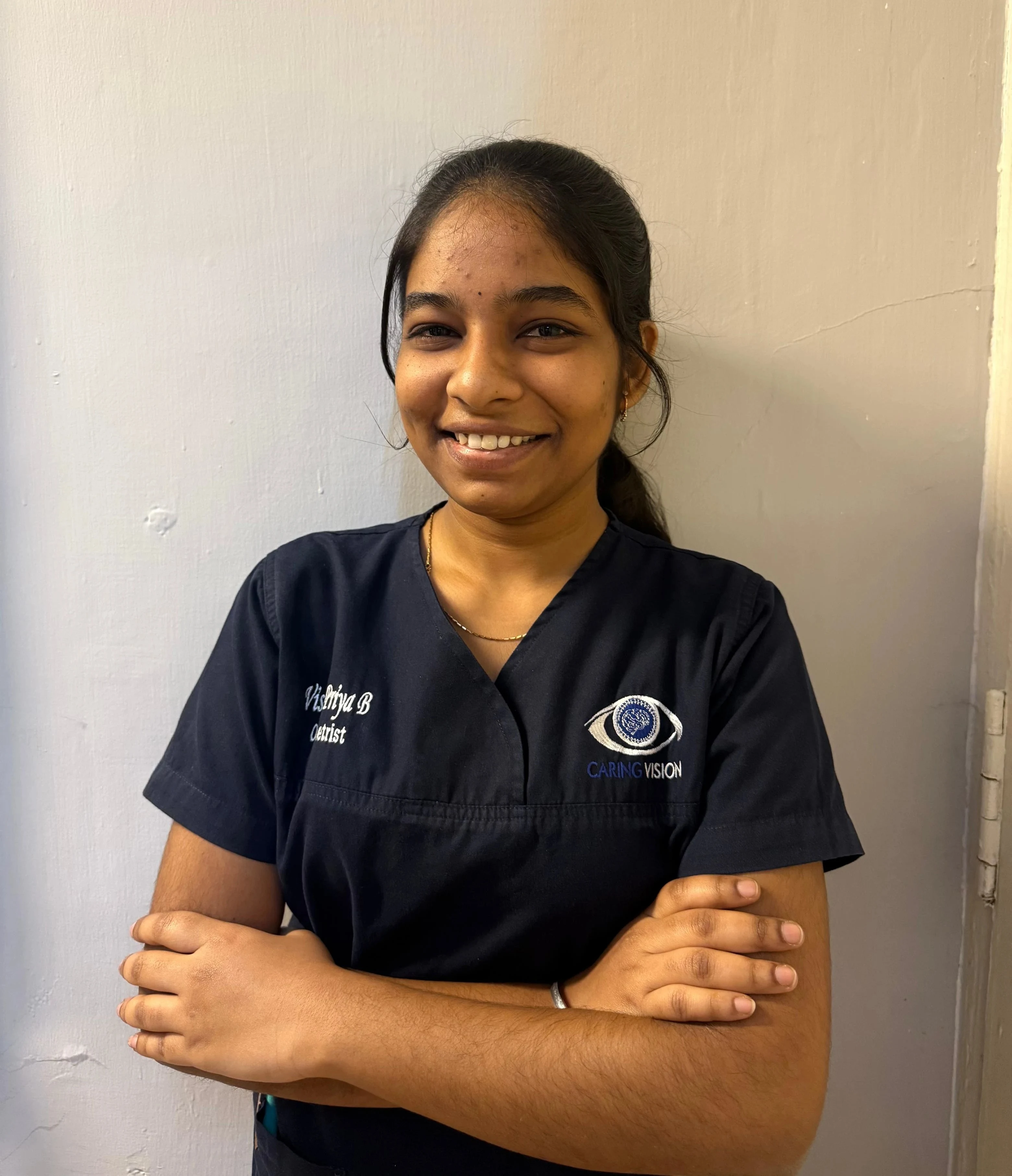 Optometrist Vishnu Priya at Caring Vision Therapy